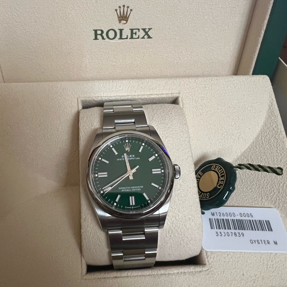 Rolex stainless steel 36mm with a green dial.Brand new2023 paper and box
